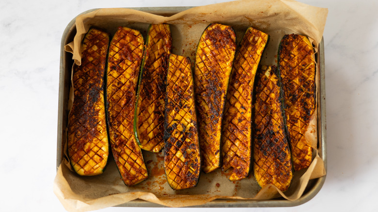 golden browned scored harissa zucchini