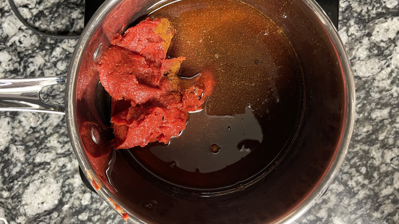 tomato paste in metal pot