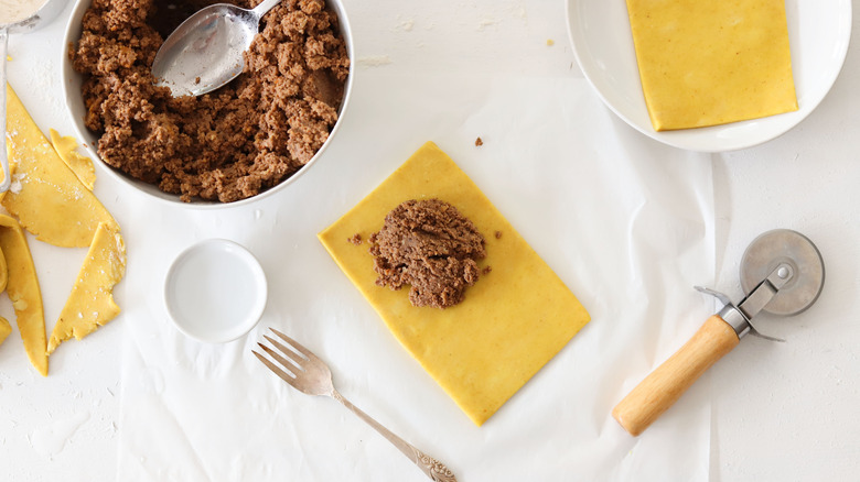 ground beef filling on dough