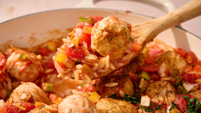 meatball and orzo in serving spoon