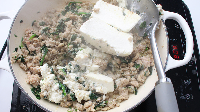 sausage spinach cheese in pan