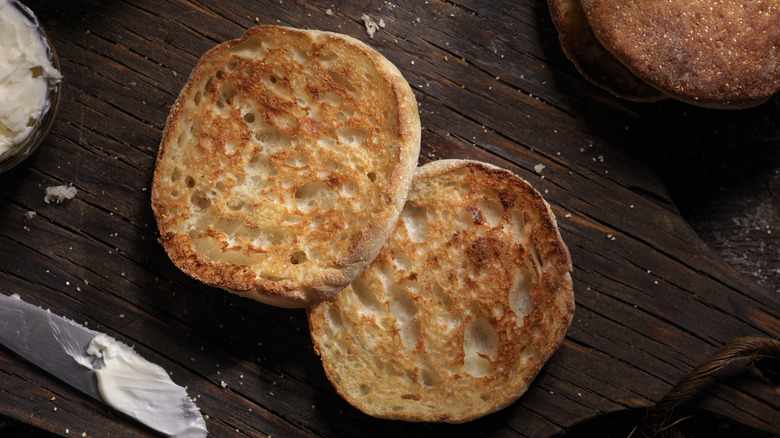 English muffin on dark wood background