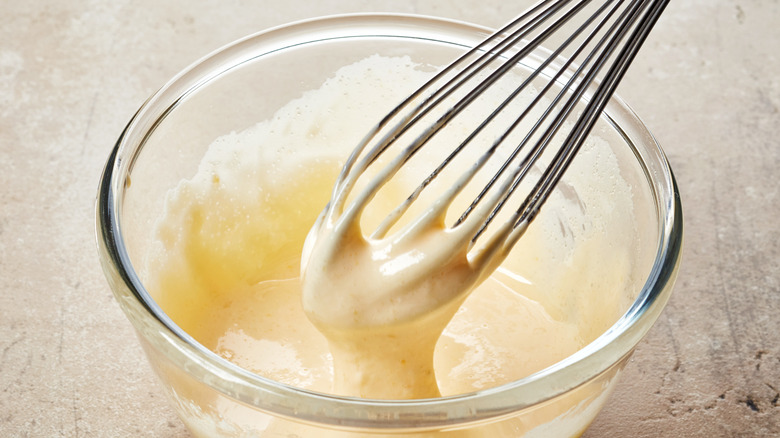 Egg custard whisked in bowl 