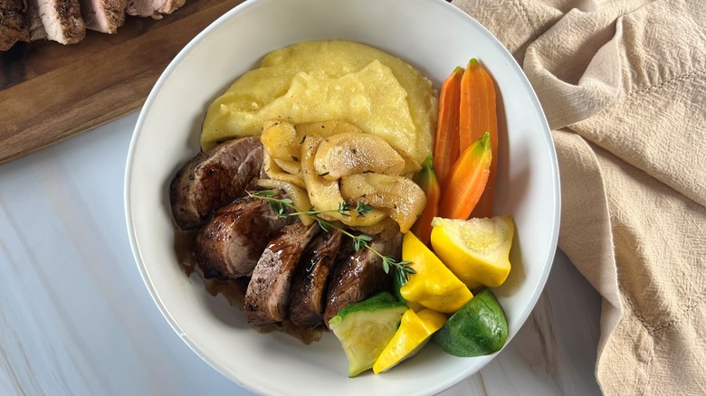 pork and vegetables in bowl