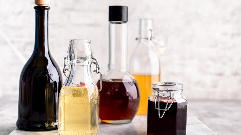 assortment of vinegars in bottles