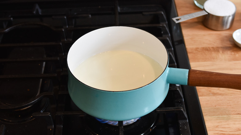 heating milk in pot