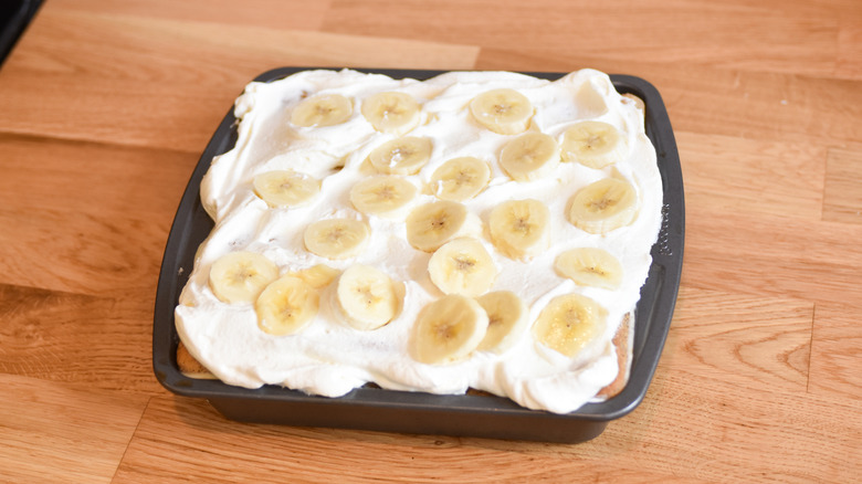 layering cream and bananas