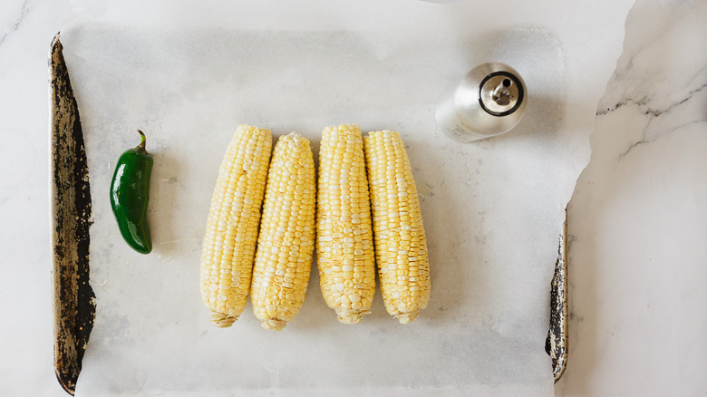 Corn on baking sheet