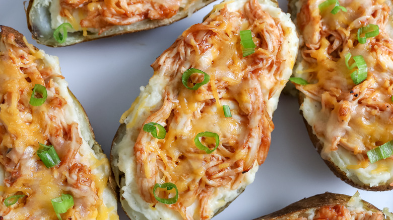 barbecue chicken-stuffed twice-baked potatoes on a plate