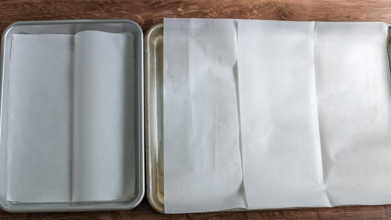 two baking sheets lined with parchment paper