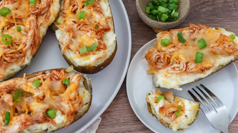 twice-baked potatoes on plates on a table