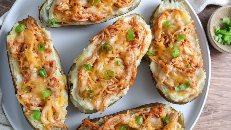 barbecue chicken-stuffed twice-baked potatoes on a plate