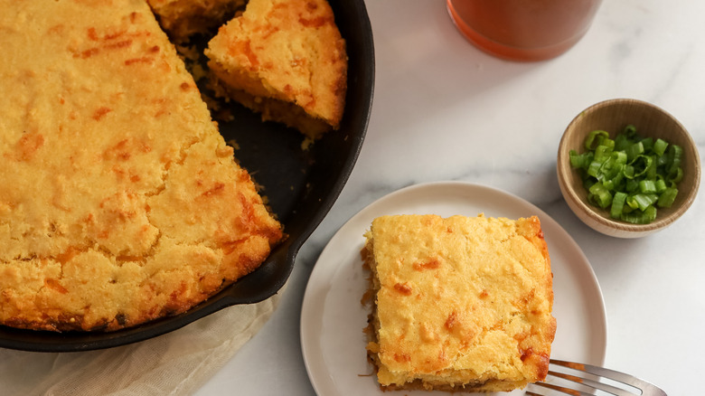 barbecue pork-stuffed cornbread on plate and in skillet
