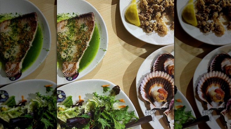 Tuna steak, fried baby squid, scallops and salad at La Paradeta