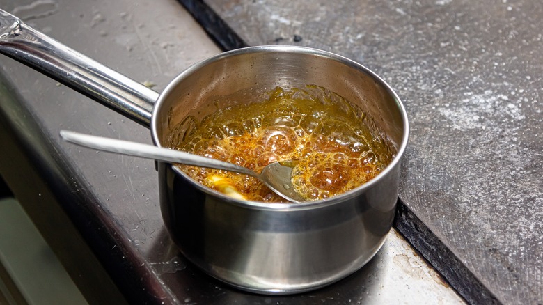 Small pot of bubbling caramel