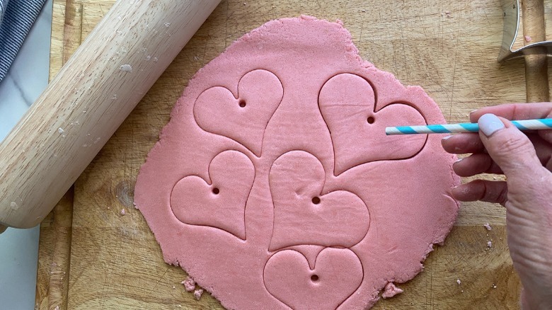 dough with heart shapes pressed in 