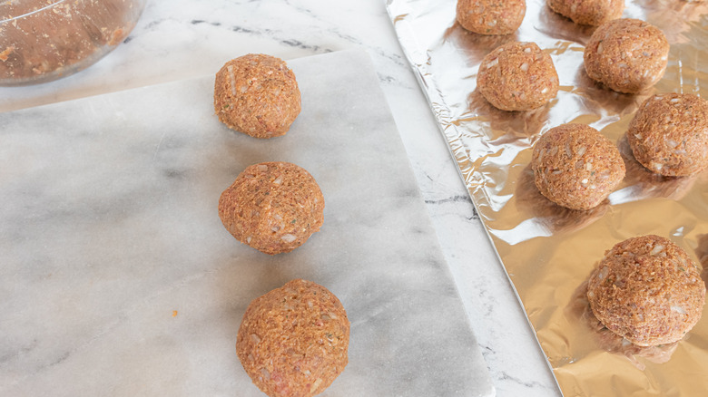 meatballs on parchment paper