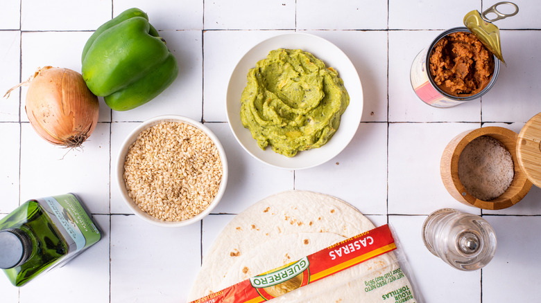 ingredients gathered for bean burritos