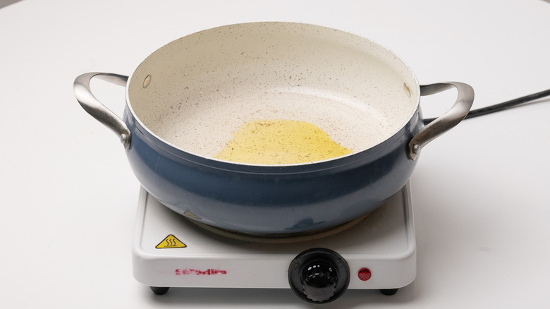 heating pan containing oil