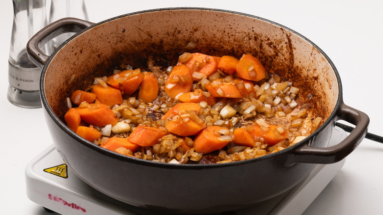 sauteing onion, garlic, and carrots