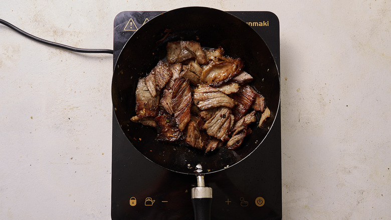 Searing beef in skillet