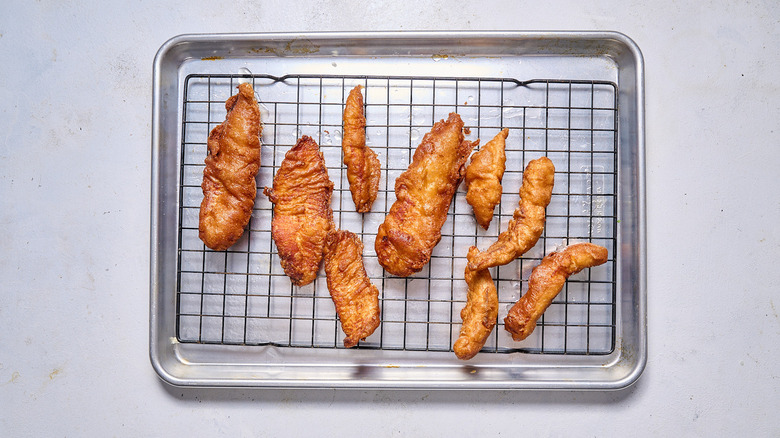 draining fish on sheet tray