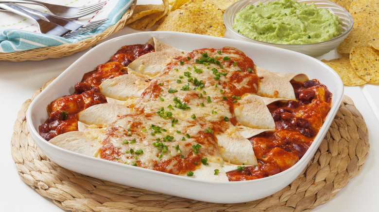 Chicken enchiladas in dish