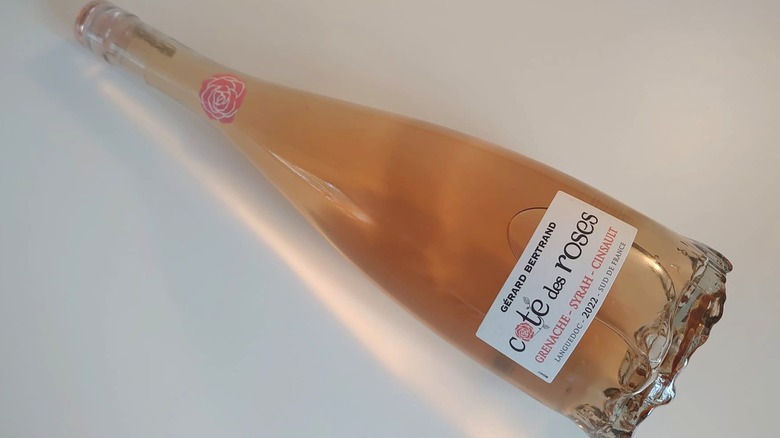 Rosé bottle on its side