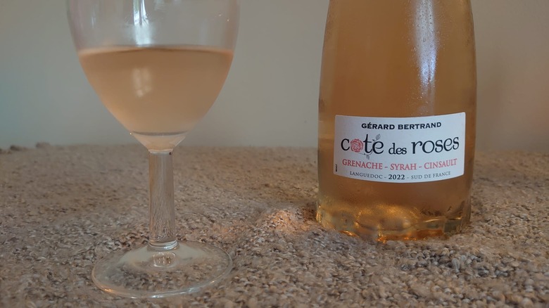 Rosé bottle and glass close up