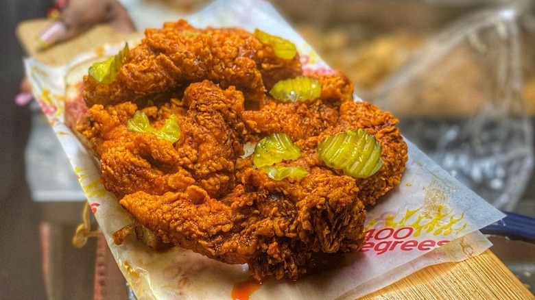 fried chicken pieces with pickles