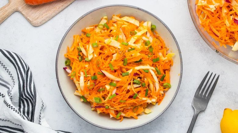 shaved carrot coleslaw in bowl