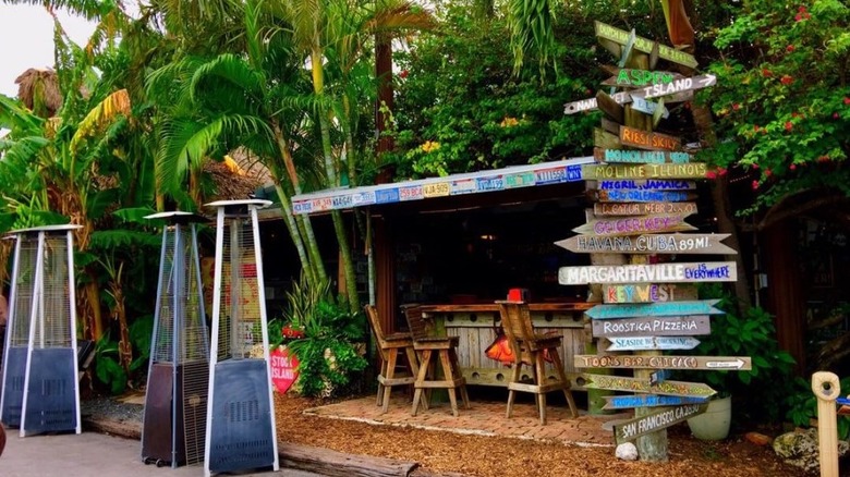 Outdoor patio bar with bright signs