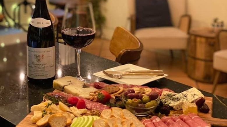 Charcuterie plate with wine