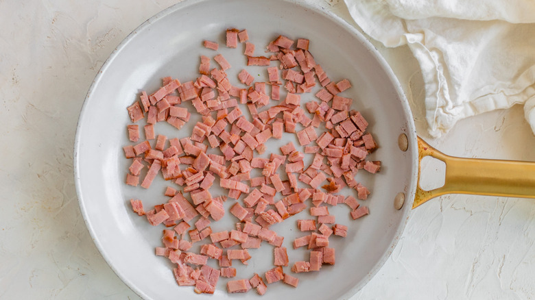 turkey bacon cubes in pan