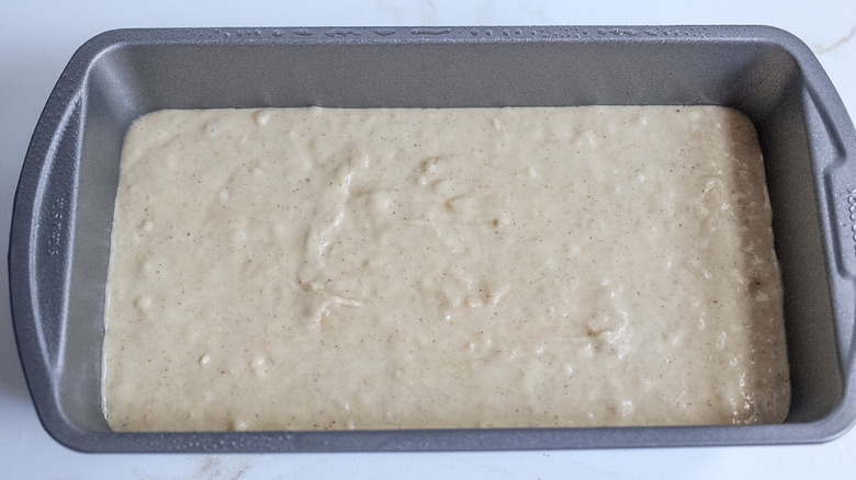 banana bread batter in pan