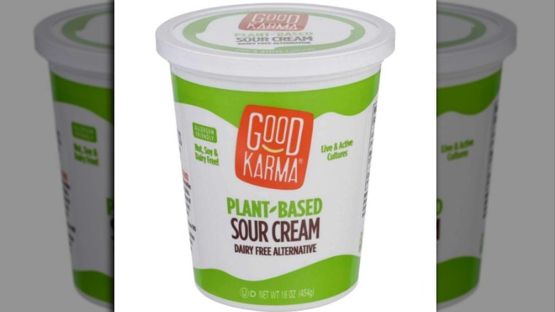 a container of good karma plant based sour cream