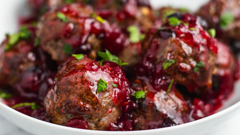 cranberry meatballs in white bowl