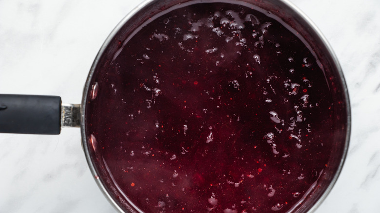 cranberry glaze in saucepan 