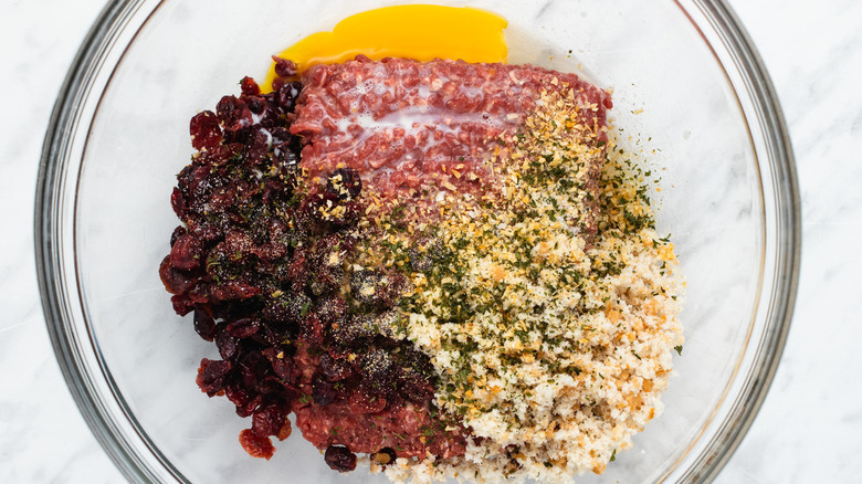 cranberry meatball ingredients in bowl 