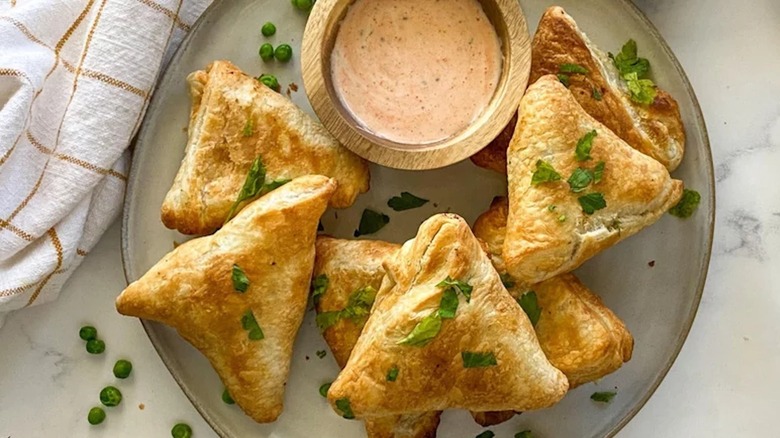 Samosas with dipping sauce