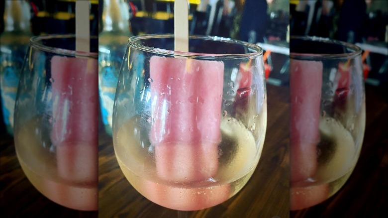 Prosecco with watermelon popsicle