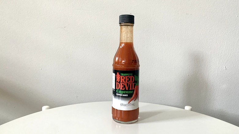 Red Devil hot sauce bottle