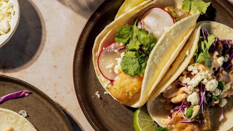 Plate of tacos with radish