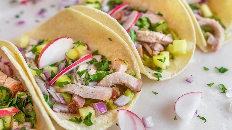 Pork tacos with radish