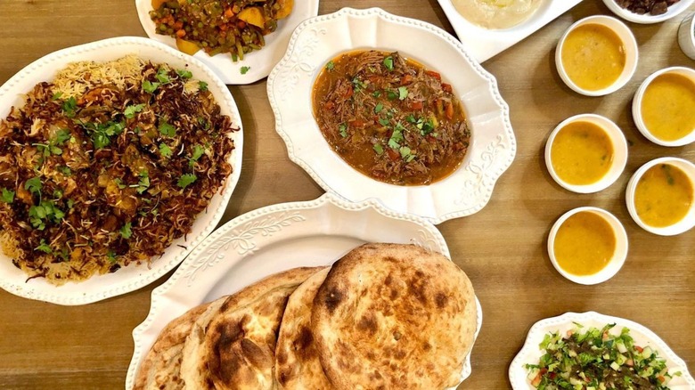 Bread with plates of food