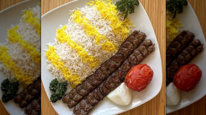 Meat kebab with tomato and rice