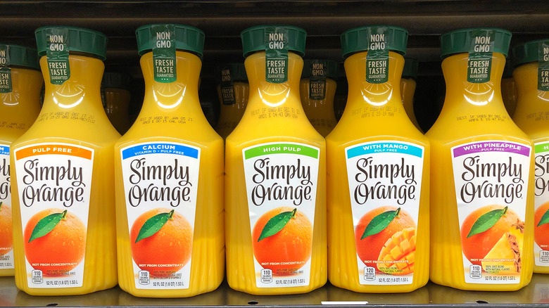 bottles of simply orange juice on shelf