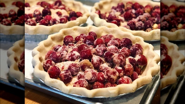 Prepared cherry pie on pan