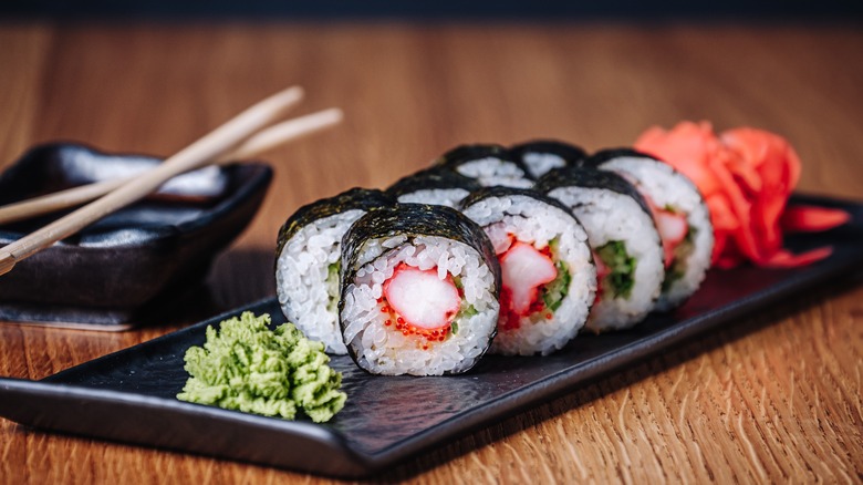 Sushi rolls on a wood table