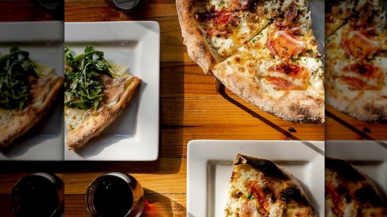 Pizza and wine on a table